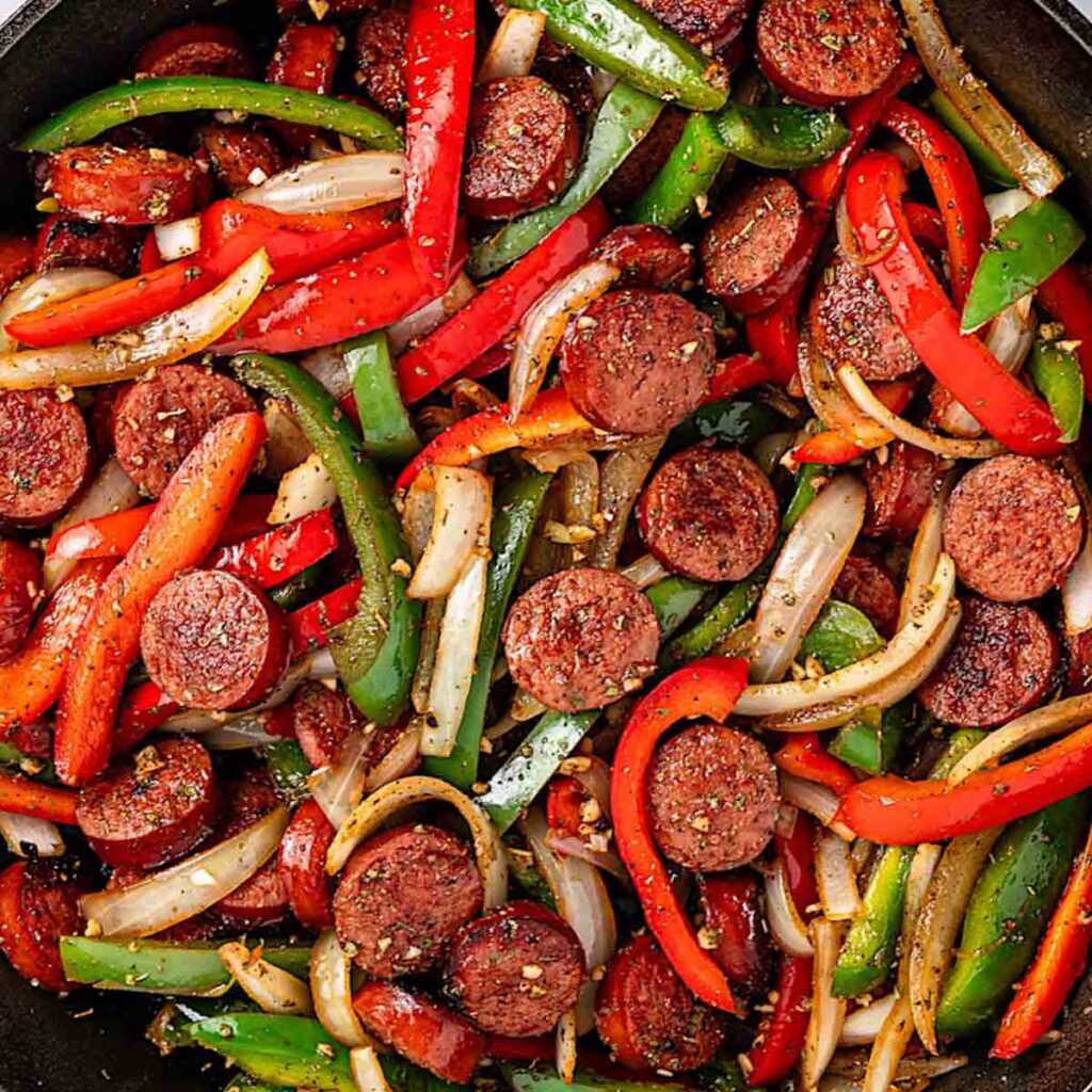 Smoked Sausage with peppers and onions - Deliciously Home Cooked